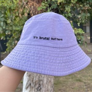 Olivia Rodrigo’s “It’s brutal out here” purple bucket hat